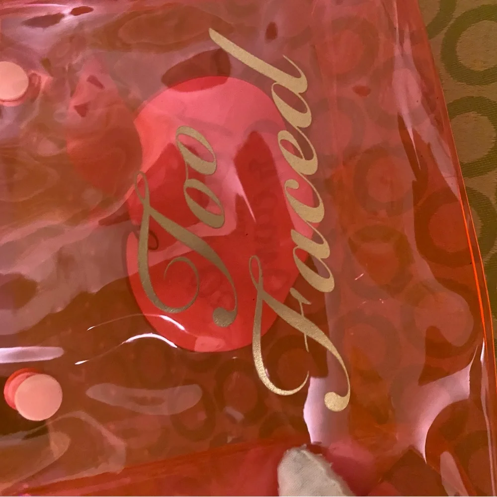 Too faced transparent cosmetic wristlet